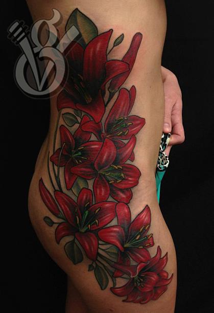Jon von Glahn - lily floral female woman side rib color tattoo